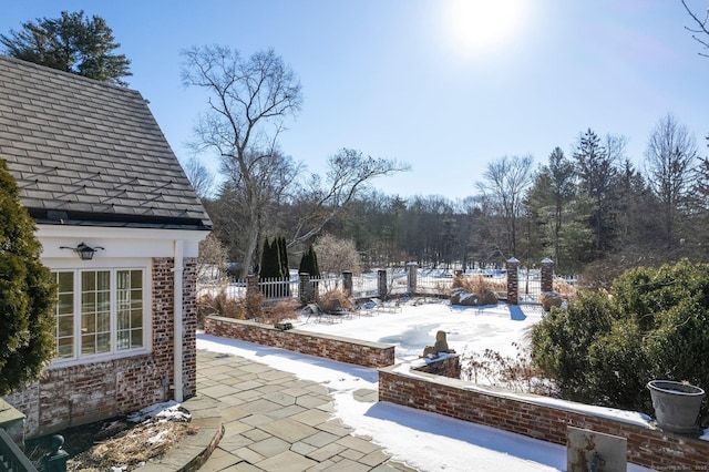 view of snow covered patio