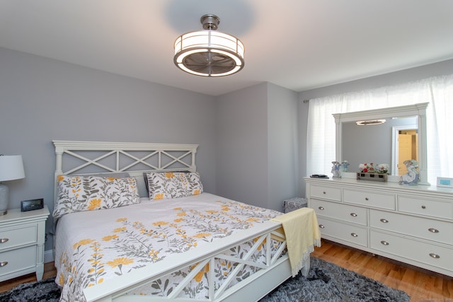 bedroom with wood-type flooring