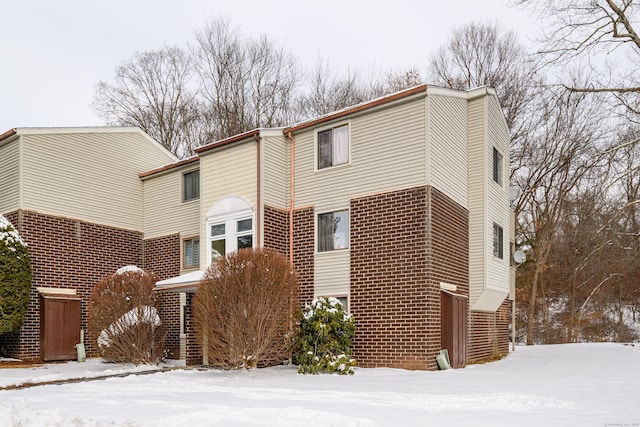 view of snow covered property