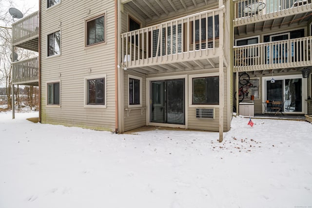 view of snow covered house