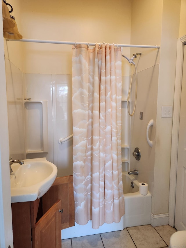 bathroom featuring shower / bath combination with curtain, tile patterned flooring, and vanity