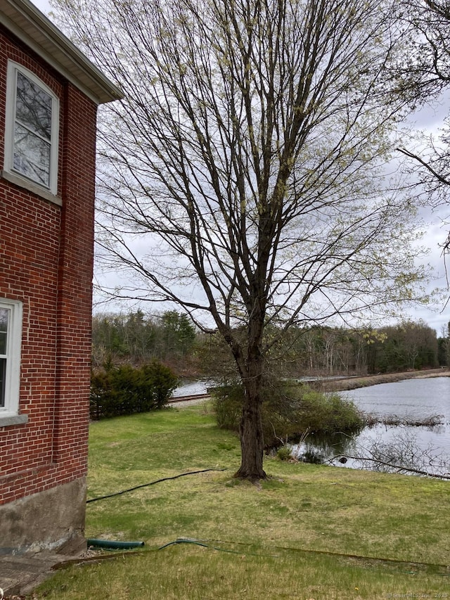 view of yard with a water view