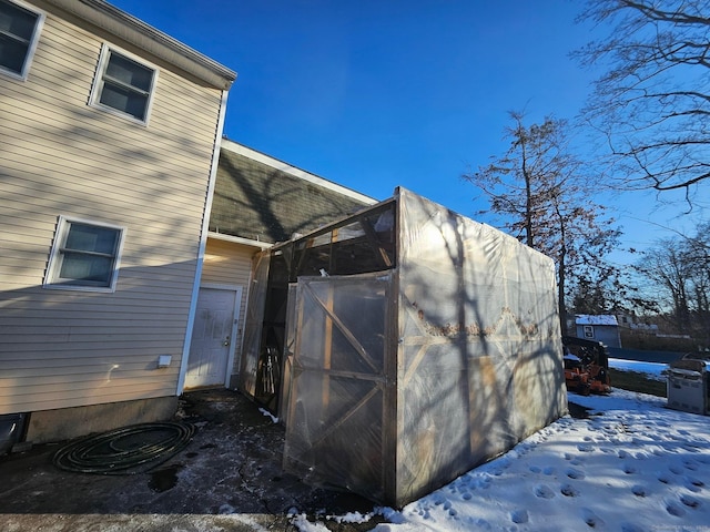 view of snow covered property