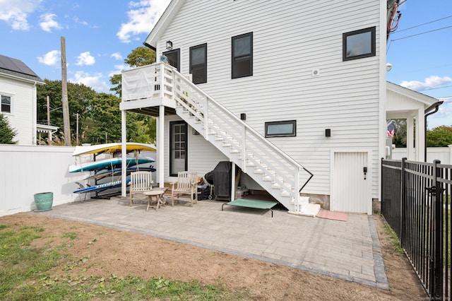 back of house featuring a patio