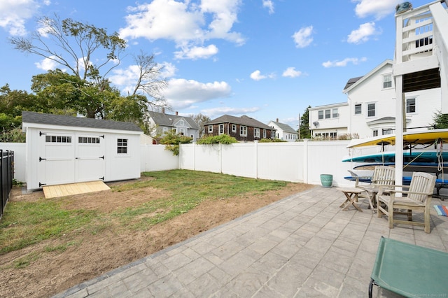 view of patio with a shed