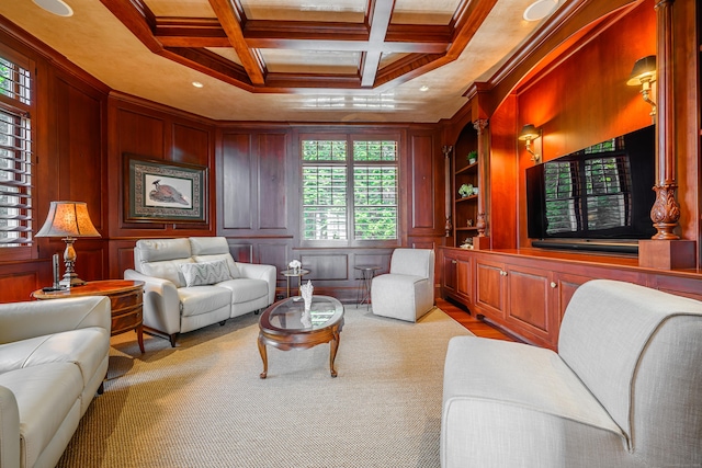 living room featuring beamed ceiling, crown molding, coffered ceiling, and wood walls