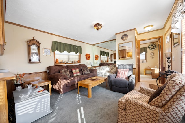 living room with crown molding, wood walls, and carpet