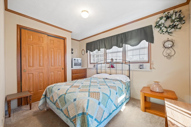 bedroom featuring light carpet, ornamental molding, and a closet