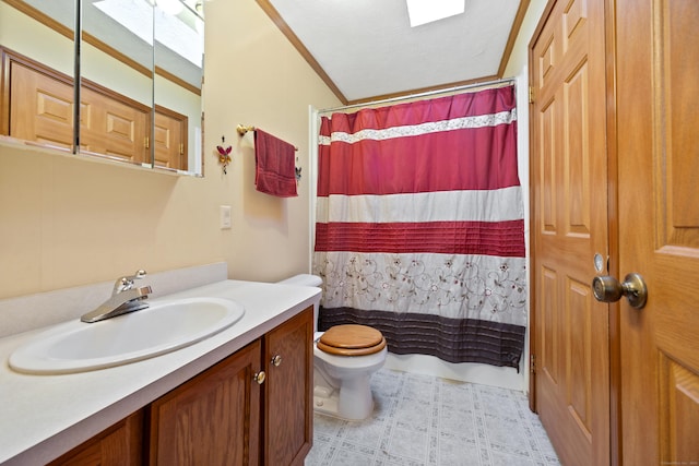 bathroom featuring vanity, vaulted ceiling, a shower with shower curtain, and toilet