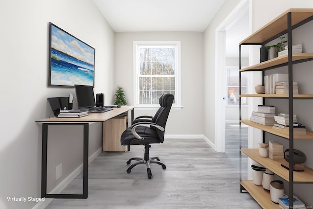 home office featuring light hardwood / wood-style floors