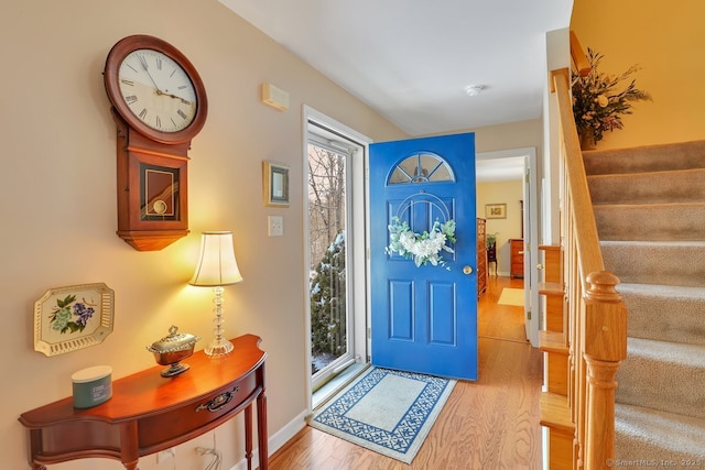 entrance foyer with light wood-type flooring