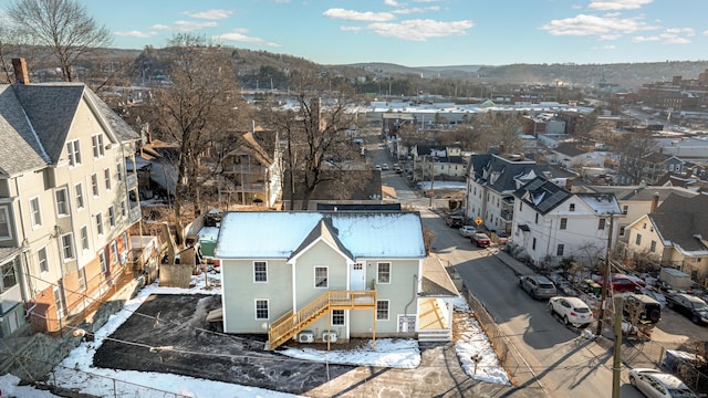 birds eye view of property featuring a mountain view