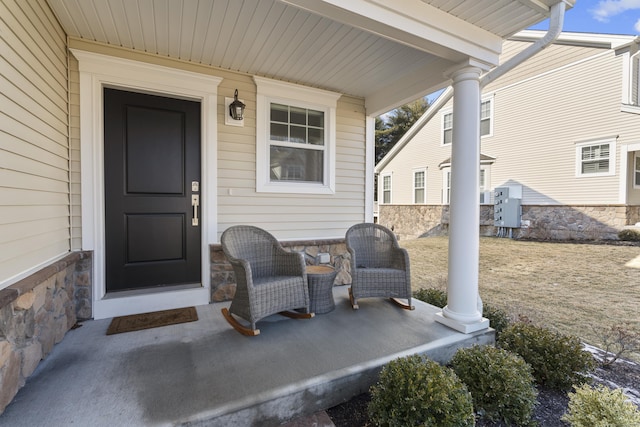 property entrance featuring a porch