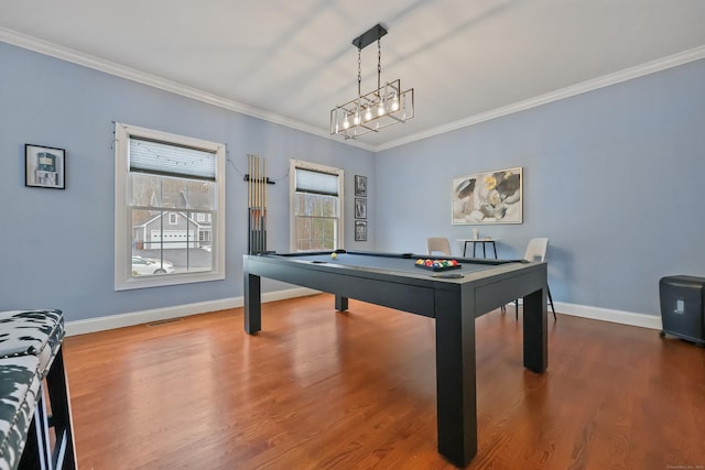 game room featuring billiards, wood-type flooring, and ornamental molding