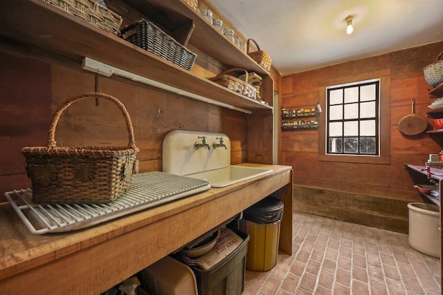 interior space featuring wood walls