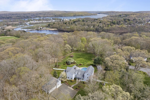 aerial view featuring a water view and a view of trees