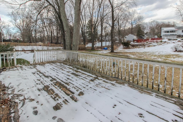 view of snow covered deck