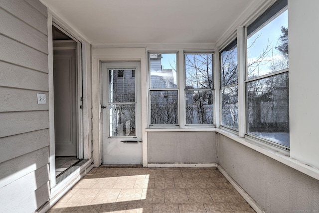 view of unfurnished sunroom