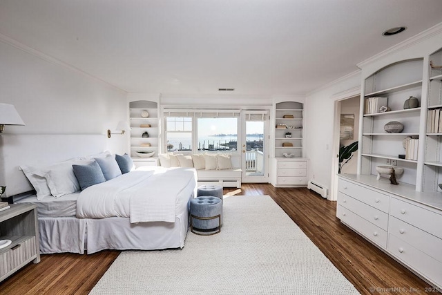 bedroom with ornamental molding, dark hardwood / wood-style floors, access to exterior, and a baseboard heating unit