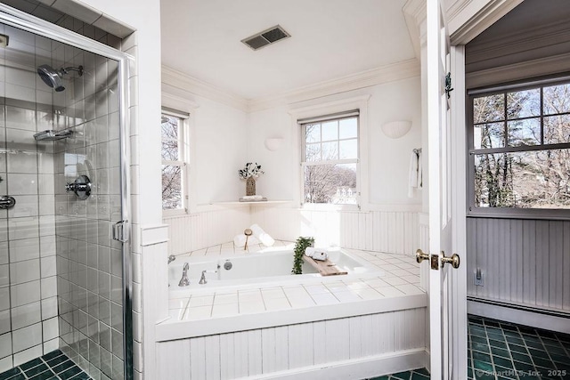 bathroom with ornamental molding and plus walk in shower