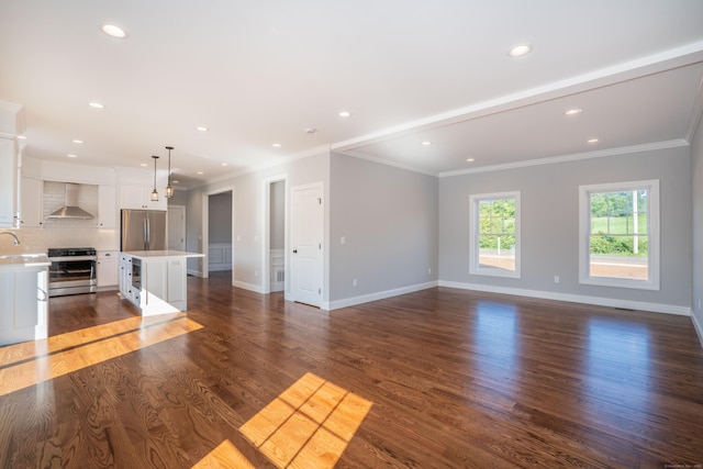 unfurnished living room featuring crown molding, dark wood-type flooring, and sink