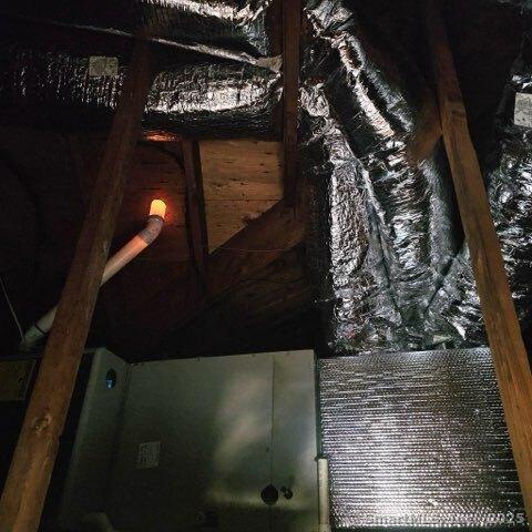 view of unfinished attic