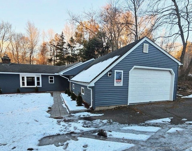 exterior space with a garage