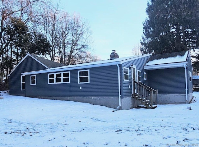 view of snow covered property