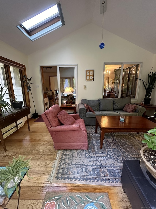 living room with wood-type flooring, a baseboard heating unit, and vaulted ceiling with skylight