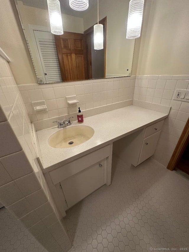 bathroom featuring vanity, tile walls, and tile patterned floors