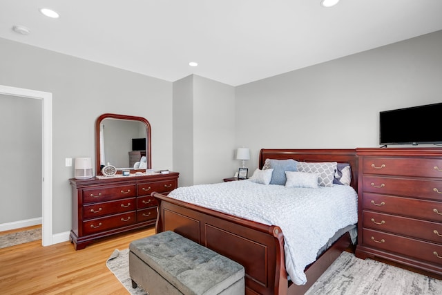 bedroom featuring light wood-type flooring