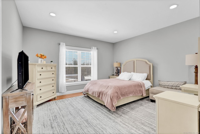 bedroom with light wood-type flooring