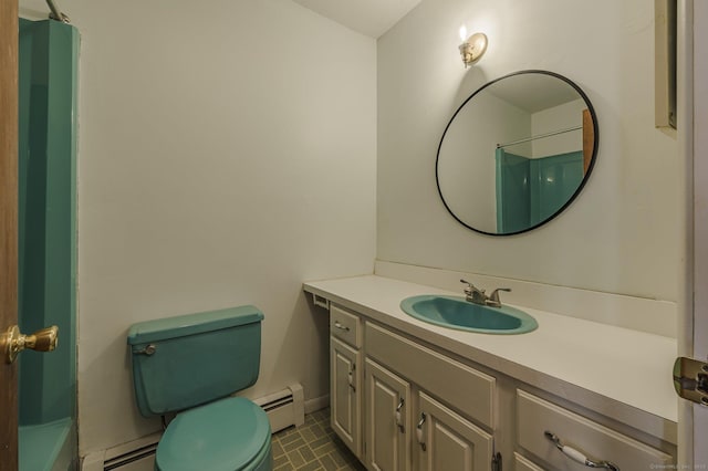 bathroom featuring vanity, a shower, toilet, and baseboard heating