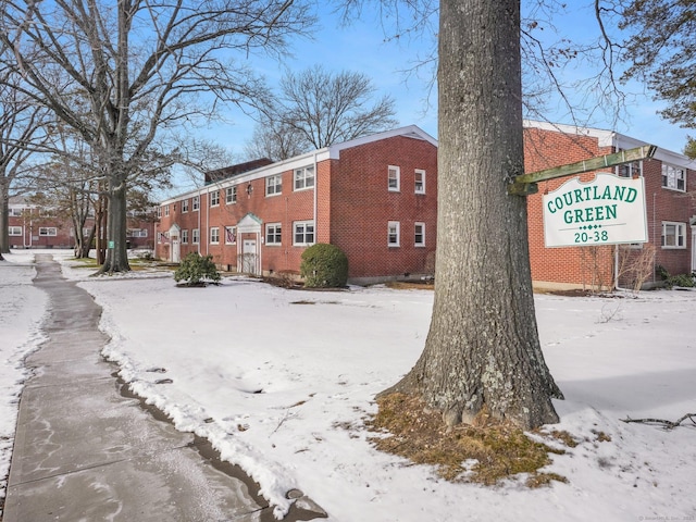 view of snow covered property