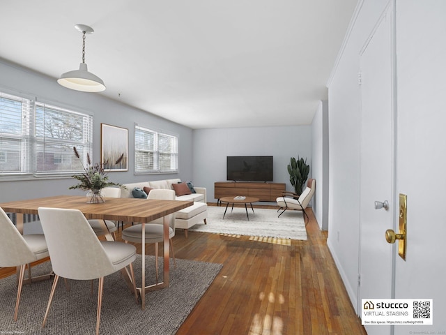 dining room with dark hardwood / wood-style flooring