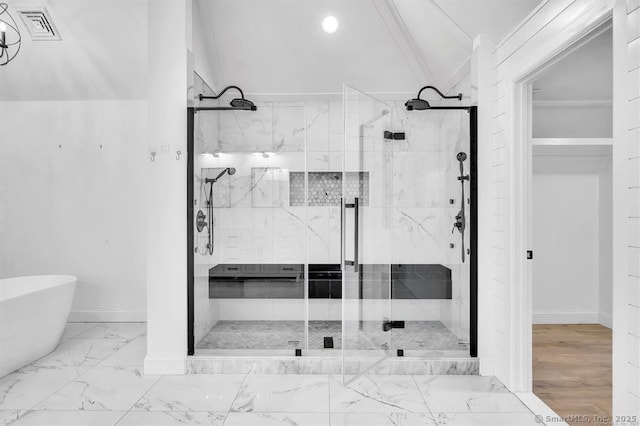 bathroom featuring plus walk in shower and vaulted ceiling