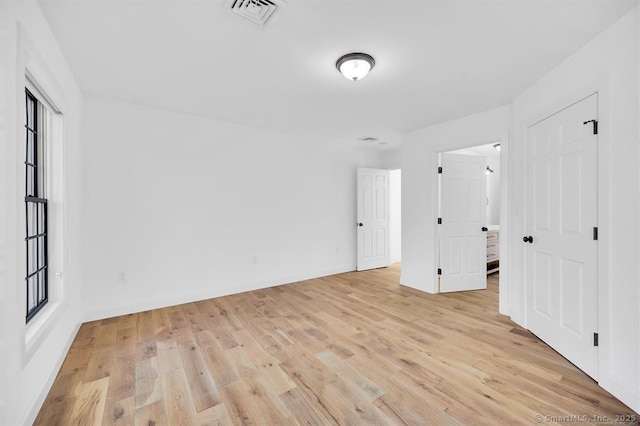 unfurnished bedroom featuring light hardwood / wood-style floors