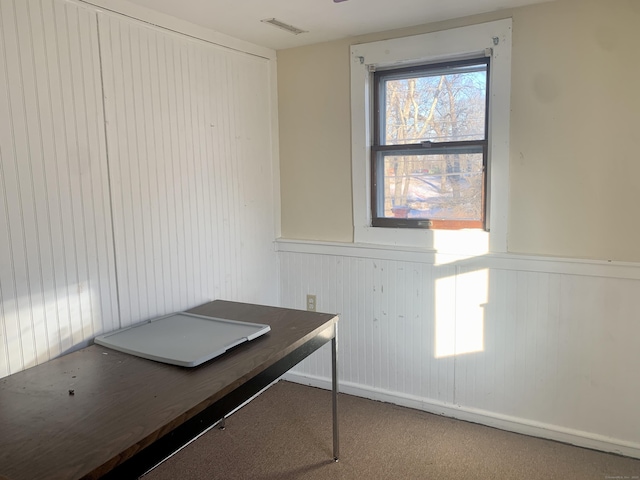 unfurnished office featuring carpet floors