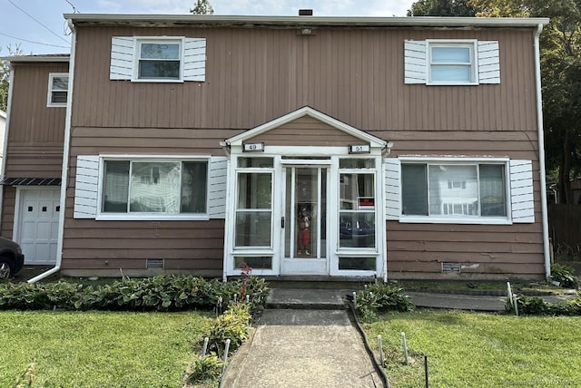 view of front of property with a front yard