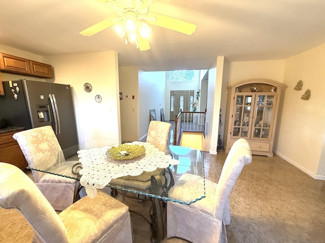 dining space featuring ceiling fan