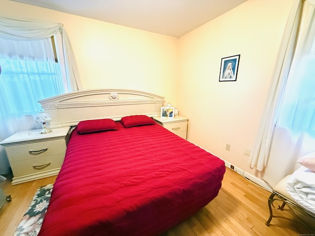 bedroom featuring light wood-type flooring