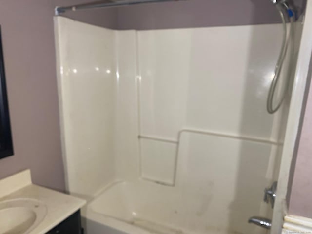 bathroom with vanity and tub / shower combination