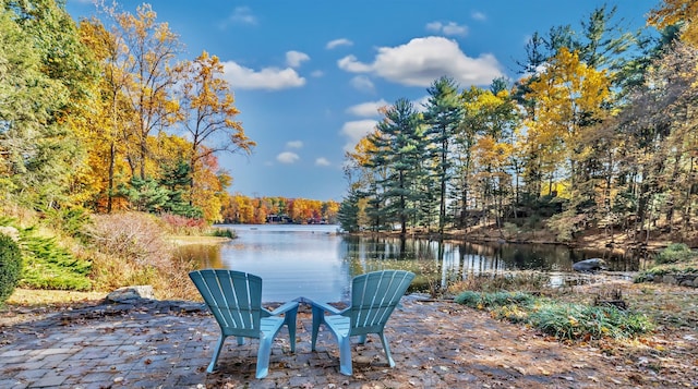 view of patio featuring a water view