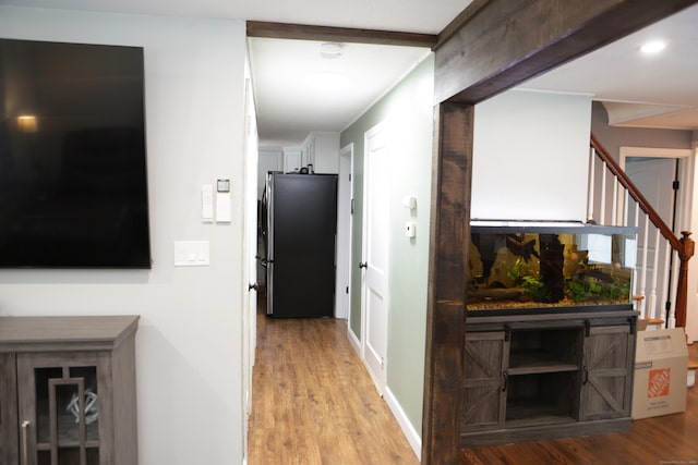 hallway featuring light wood-type flooring