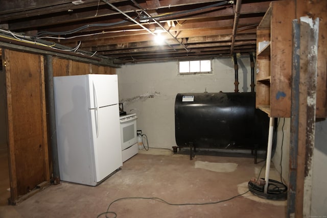 basement featuring white fridge