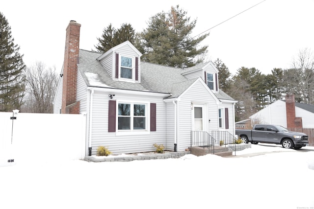 view of new england style home