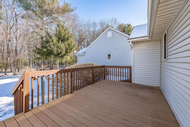 view of snow covered deck