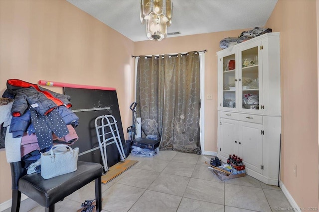 misc room featuring light tile patterned floors