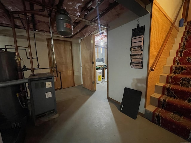 basement featuring water heater