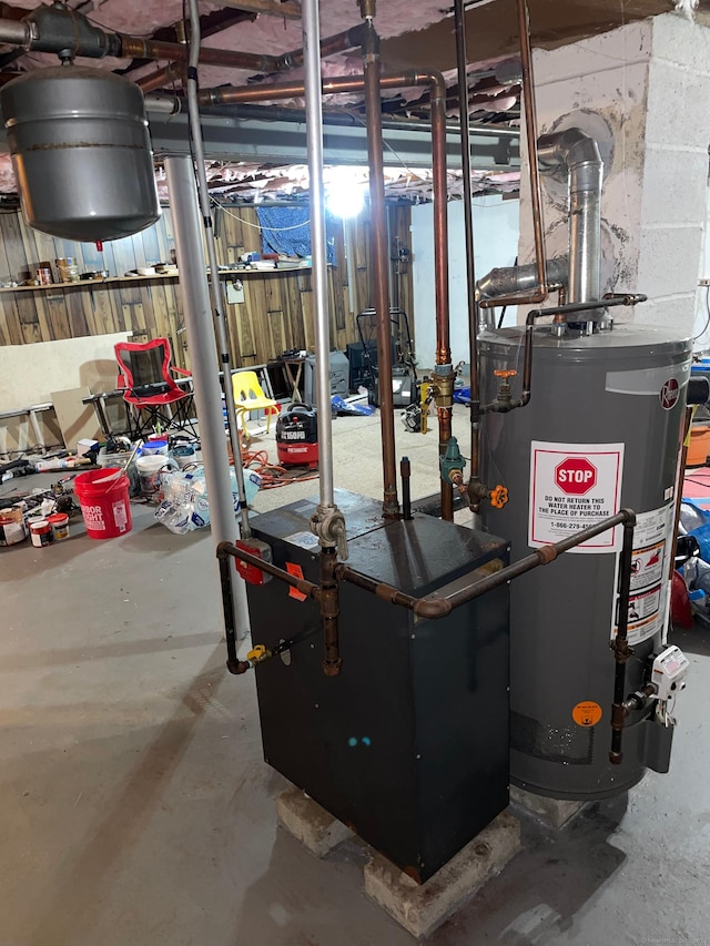 utility room with water heater